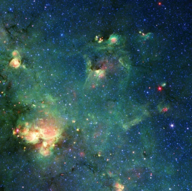 The nebula, hiding a certain someone. (NASA/JPL-Caltech)